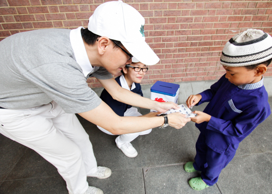 First Tzu Chi Singapore Flag Day Plants Seeds of Good