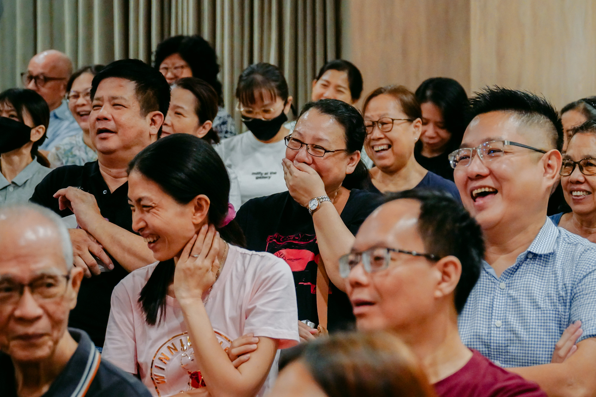 On Monday evening, many people made the effort to attend the All in the Heart book launch after work. Enjoying David Liu’s humorous and witty speech, the audience forgot their fatigue from the day and bursts of laughter filled the room. (Photo by Tan Shay Ching)